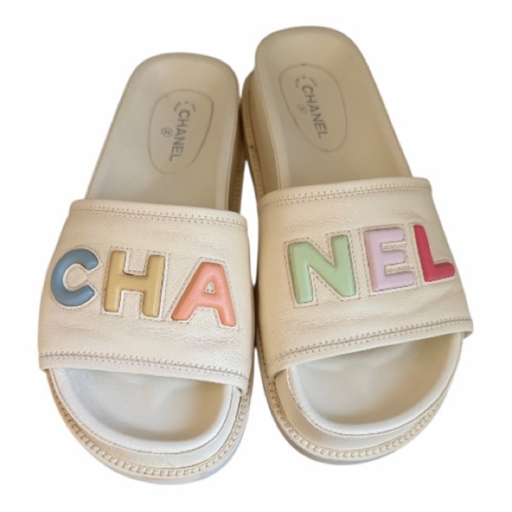 Authentic! CHANEL Cream Sandals with Multicolor Letters